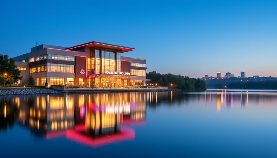 Blue-hour waterfront view of Casino du Lac-Leamy with warm lights reflected on the lake, with distant treeline and Ottawa-Gatineau skyline lights softly visible, no readable signage.